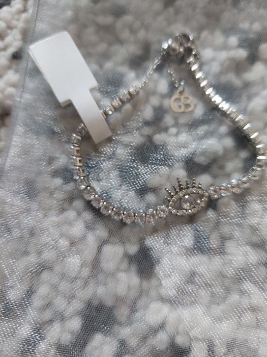 Pulseira prateada em aço nova