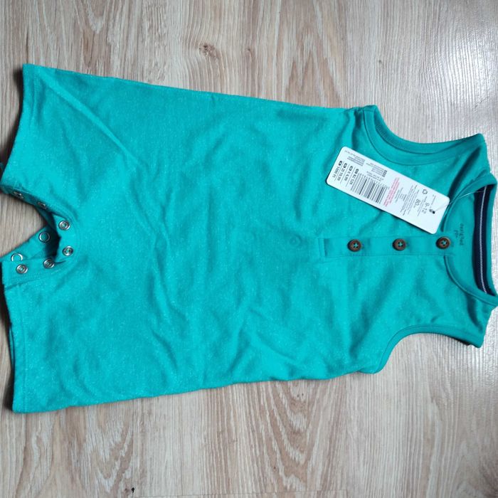 Srzedam NOWY rampers bez rękawów body roz.80cm