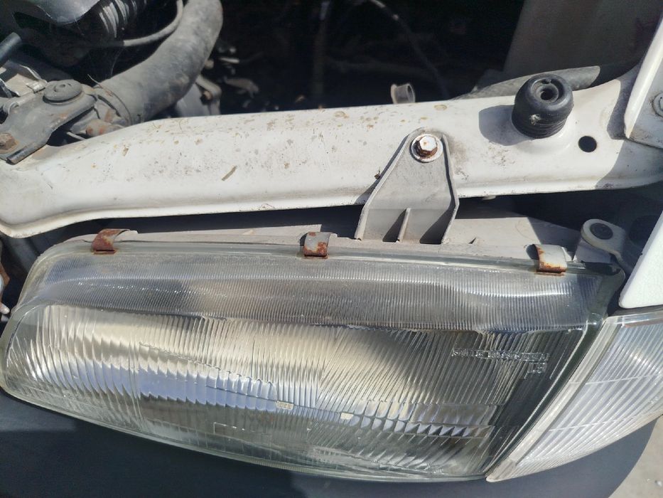 Ótica / farol esquerda HYUNDAI H-1 (A1)