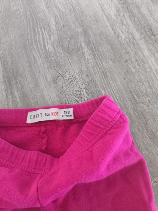 Różowe legginsy spodnie Carry r 122