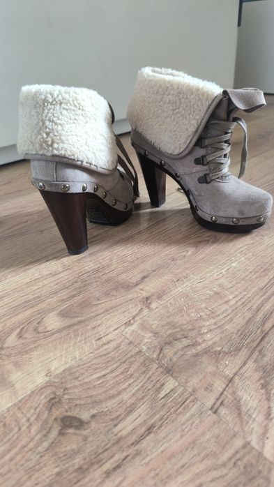 Botas de salto alto novas