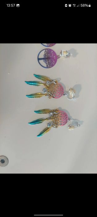 Brincos de mola da claires