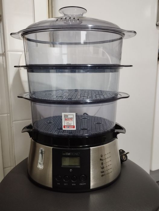 Panela de cozer a vapor em estado perfeito