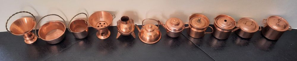 Conjunto de miniaturas em cobre