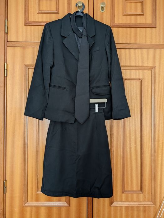 Traje académico feminino