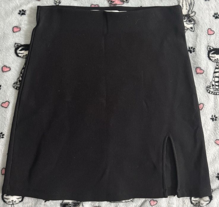 Міні-спідниці жіночі чорного кольору