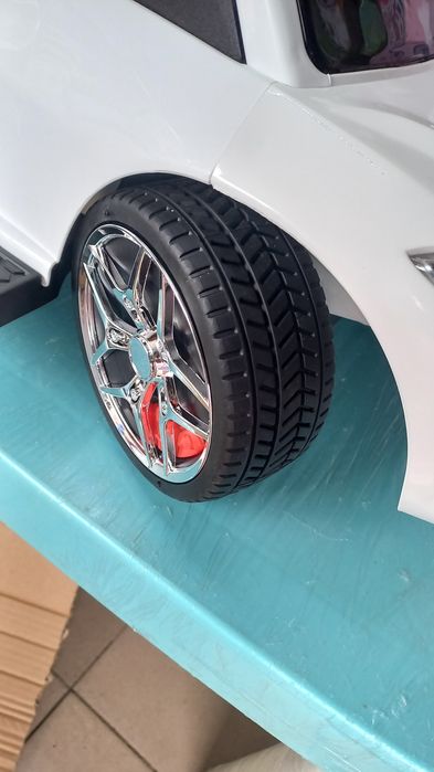 Толокар каталка гумові колеса,поворотна ручка,шкіра єко сидіння,муз.св