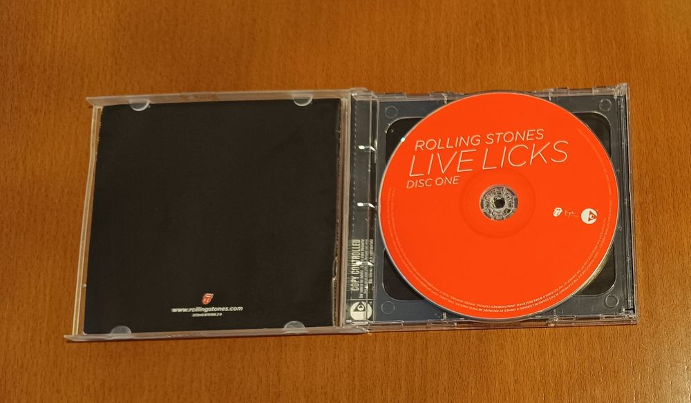 CD de Rolling Stones e SuperHeavy como Novos.