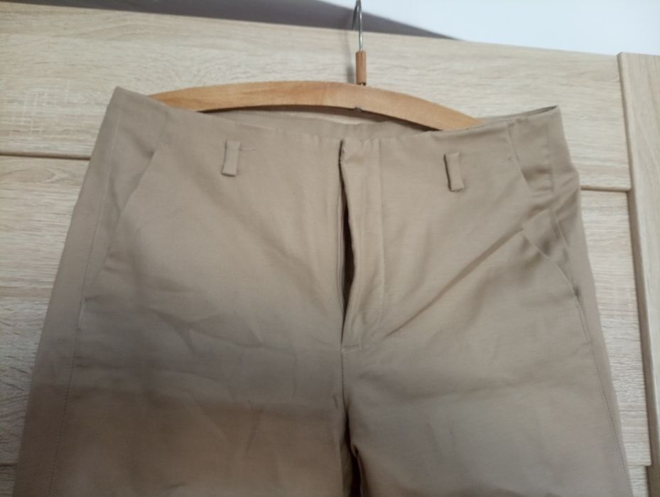 Beżowe spodnie biurowe 38