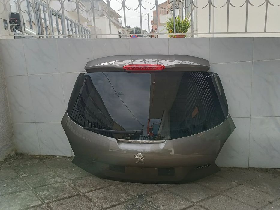 tampa mala Peugeot 208 2013