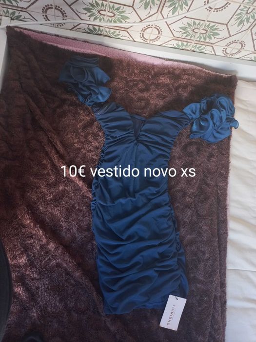 Roupa mulher e mala original  marca prada custa 1.200