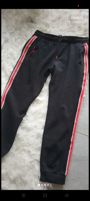 Nowe spodnie dresowe czarne z czerwonym Guess