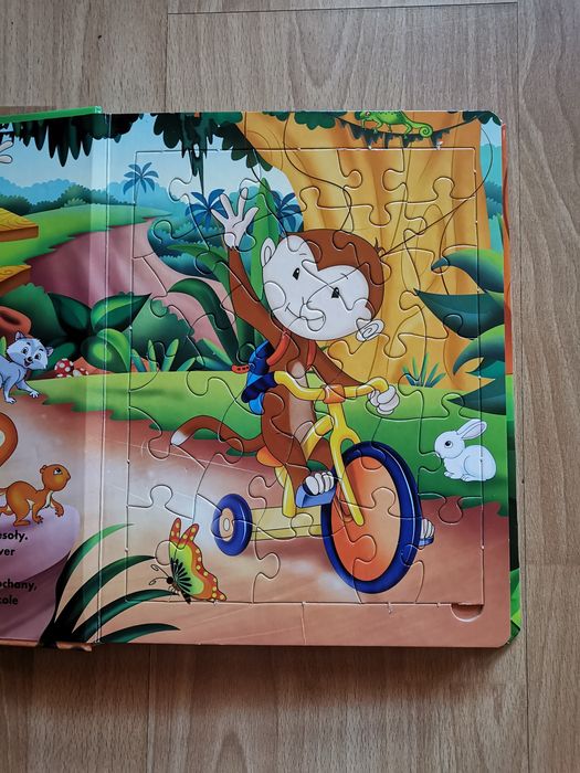 Książka z puzzlami Miki idzie do szkoły wydawnictwo Book House.