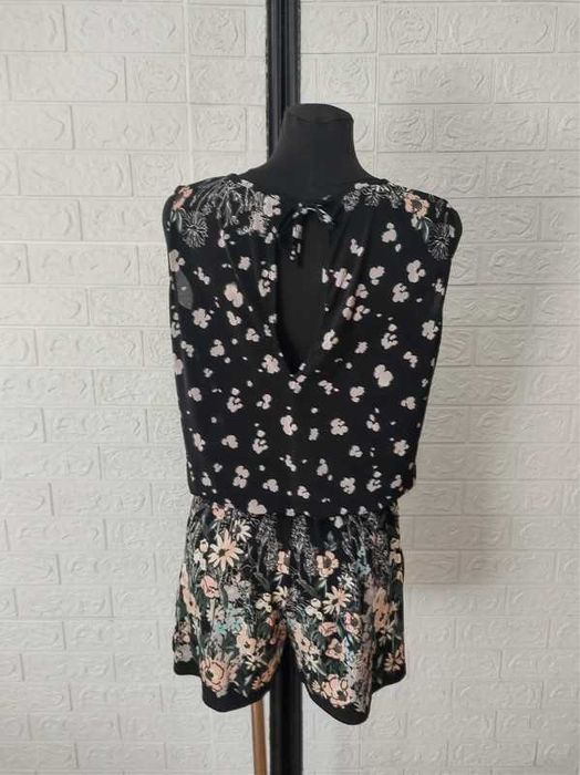 Kombinezon rozmiar L elastyczny cena 30 zł