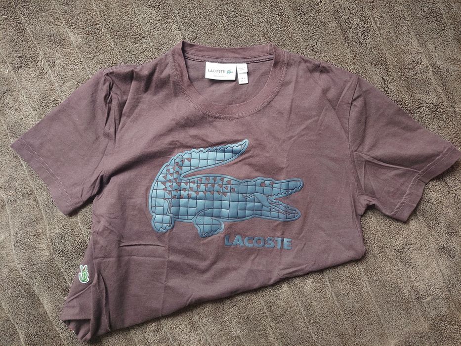 Футболка фірми lacoste оригінал 

Размер: S/ M

Заміри детальні:

Довж