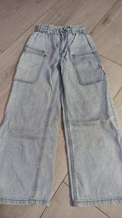 Spodnie jeansy 40 zł para 152