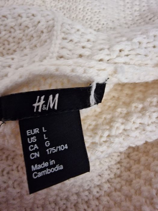 Bezrękawnik ecru " H&M".