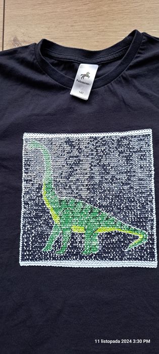 Bluzka t-shirt z długim rękawem C&A roz. 140 cekiny dinozaury