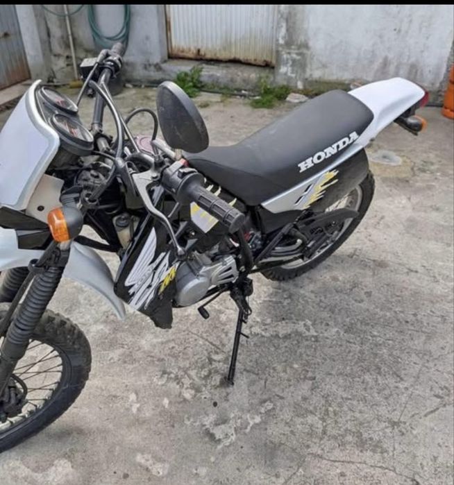 Motorizada Honda DT