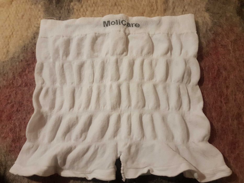 Труси для фіксації памперсів і прокладок