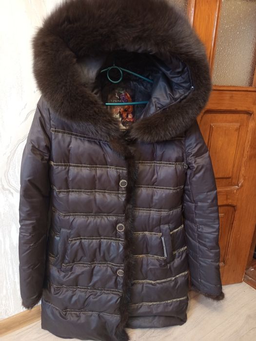 Пуховик оздоблений норкою
