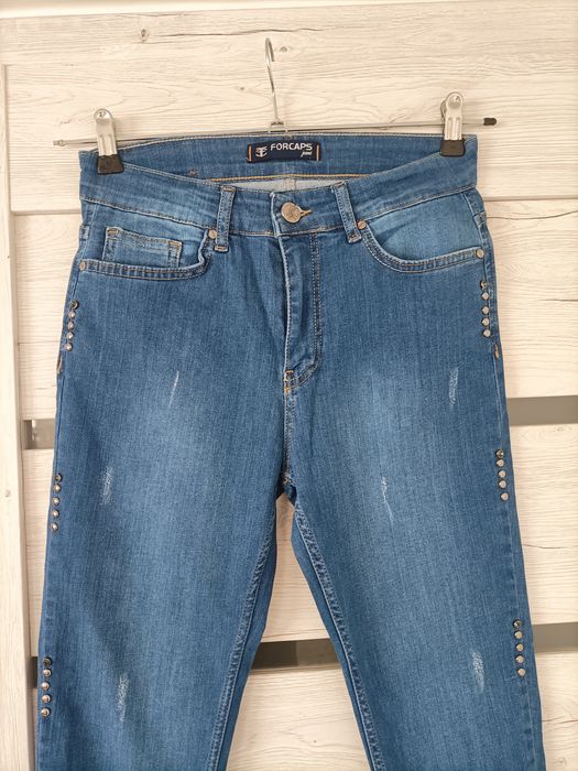 Nowe spodnie jeansowe z wysokim stanem dopasowane S/36 niebieskie