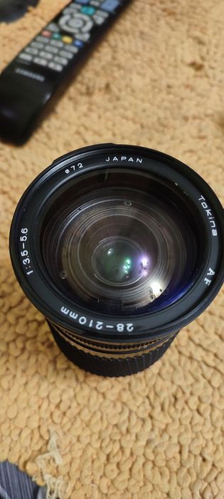 А объектив токина 28 210 мм, байнет на canon