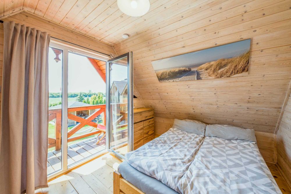 DOMKI DREWNIANE AHOI JANTAR domek Wakacje nad morzem MORZE gm Stegna