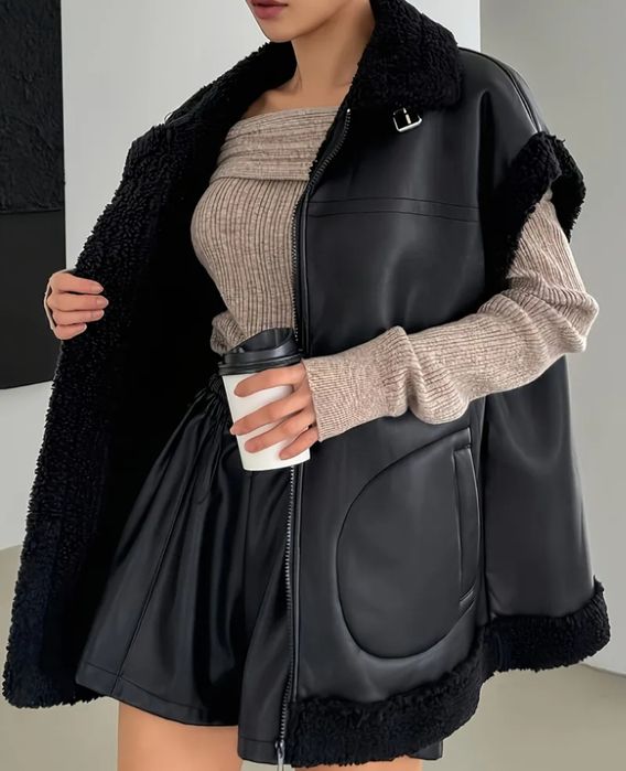 Жіночий стильный жилет з екошкіри на штучному хутрі.