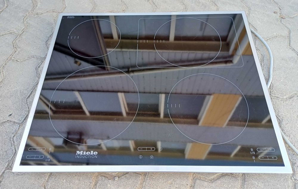 Вбудована варильна поверхня індукційна 60 см Міле Miele KM 6115 бустер б/в встраиваемая индукционная поверхность плита Миле б/у