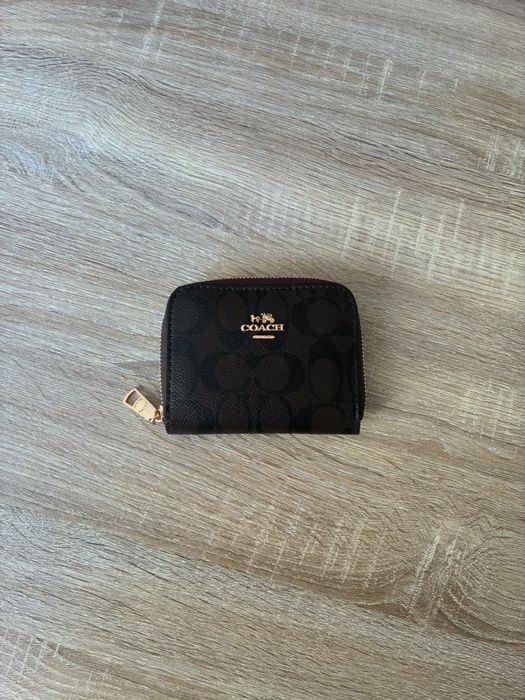 Porta moedas Coach
