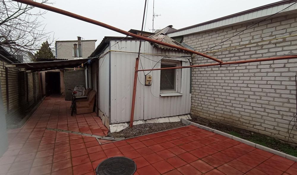 Частина будинку з гаражем на Павлівці