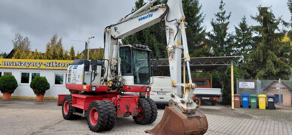 Komatsu 148 (2012r) 160 PW 140  świeżo sprowadzona , cała historia serwisowa , super stan