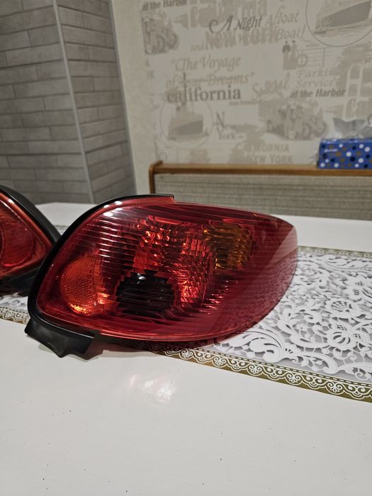 Задні фари Peugeot 206 дорестайлінг та рестайлінг