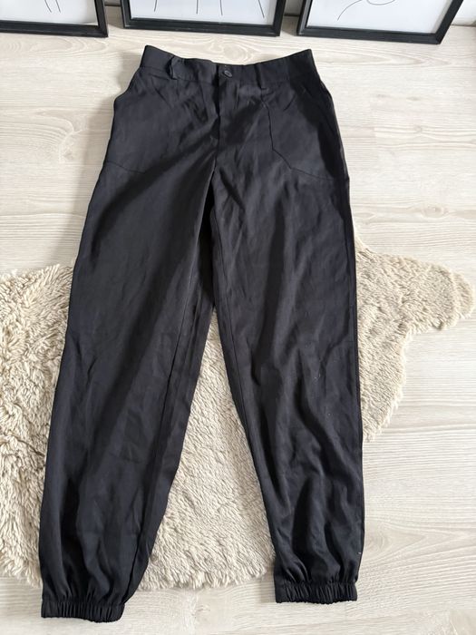 Nowe! Czarne damskie spodnie cargo ze ściągaczem w nogawce l M (38)