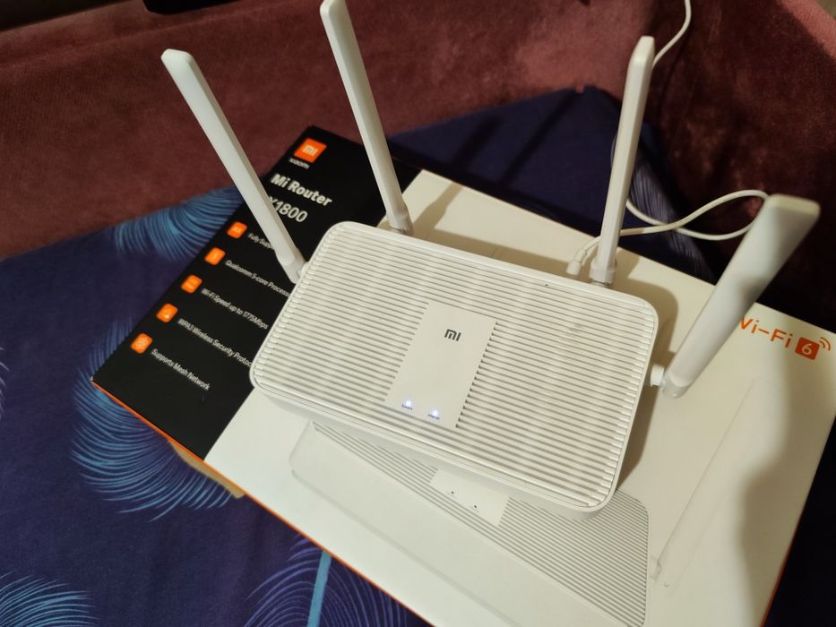 Роутеры TP-LINK TL-WR841N 9V и Xiaomi Mi Router AX1800