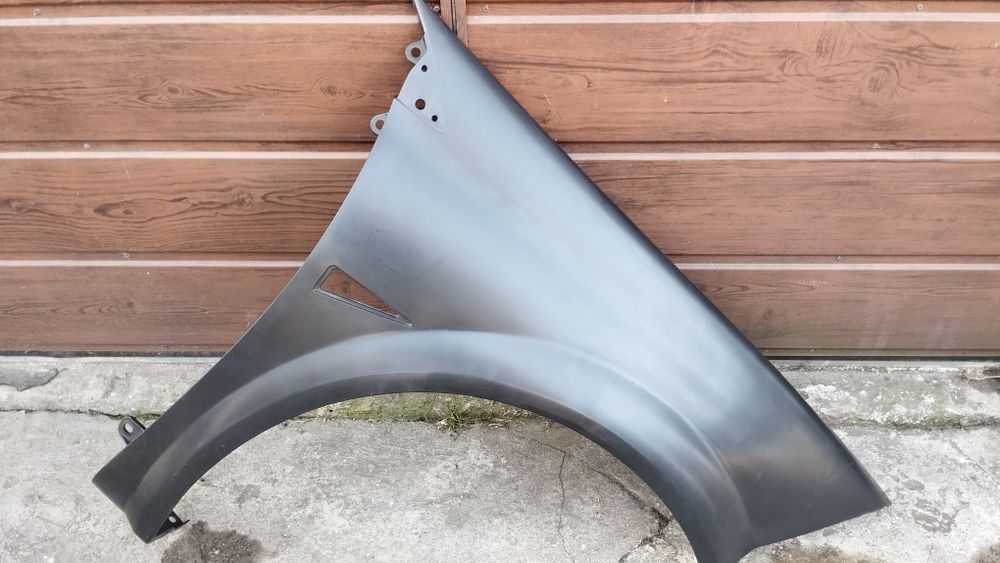 Prawy przedni błotnik Megane 2