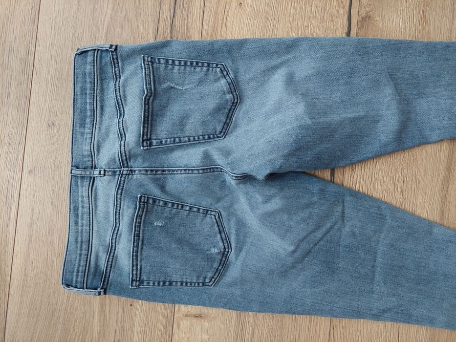 Jasnoniebieskie spodnie dżinsowe dżinsy w 28 regular Gap