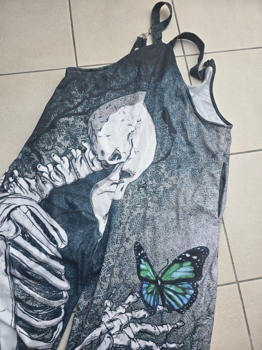 Ogrodniczki kościotrup i motyl