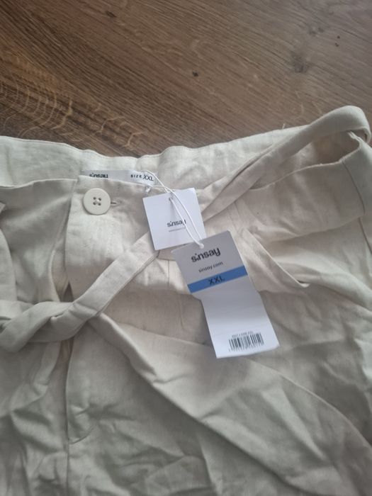 Nowe spodenki krótkie beżowe XXL