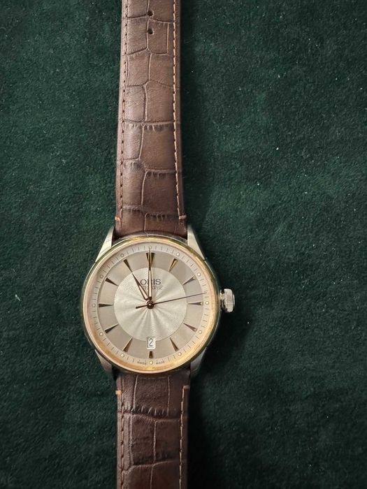 Новые часы  Oris  с золотым безелем   733.7591.63.51 LS.5.21.70FS