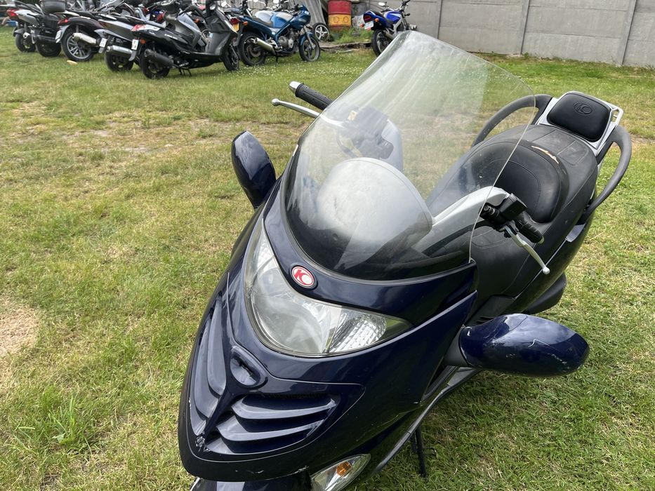 Kymco Grand Dink 125 na części czasza osłony gaźnik lusterka płozy