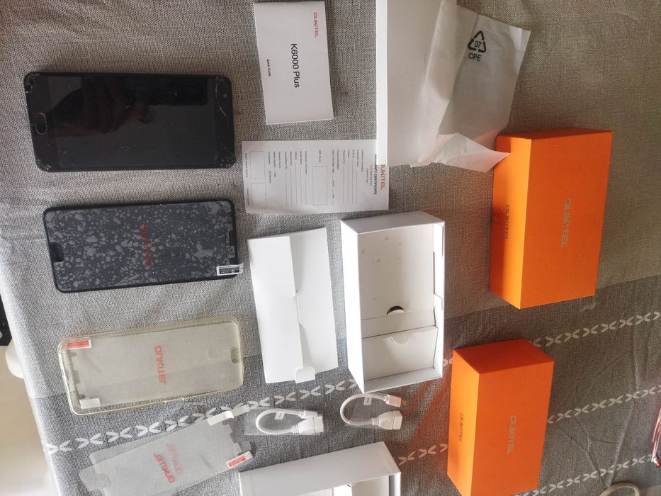 2 telemóveis smartphone Oukitel k6000 plus na caixa para peças