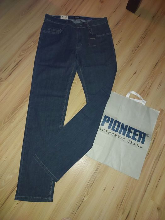 Nowe spodnie jeansowe  rozm.35/34