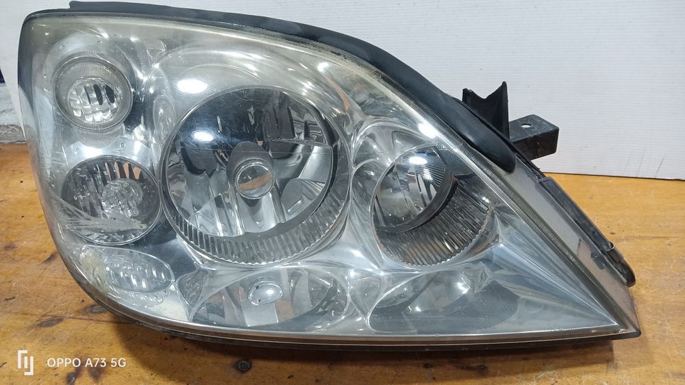 Farol Nissan primera p12 ótica xenon