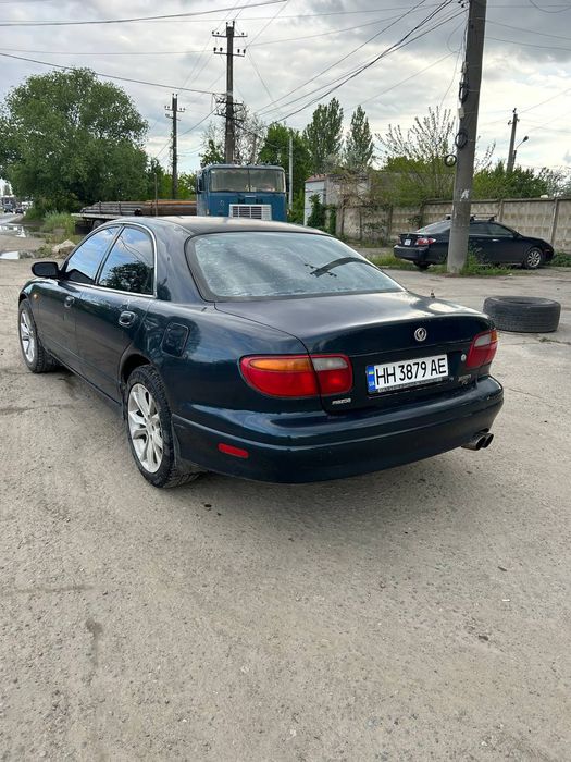 Мазда кседокс 9 .