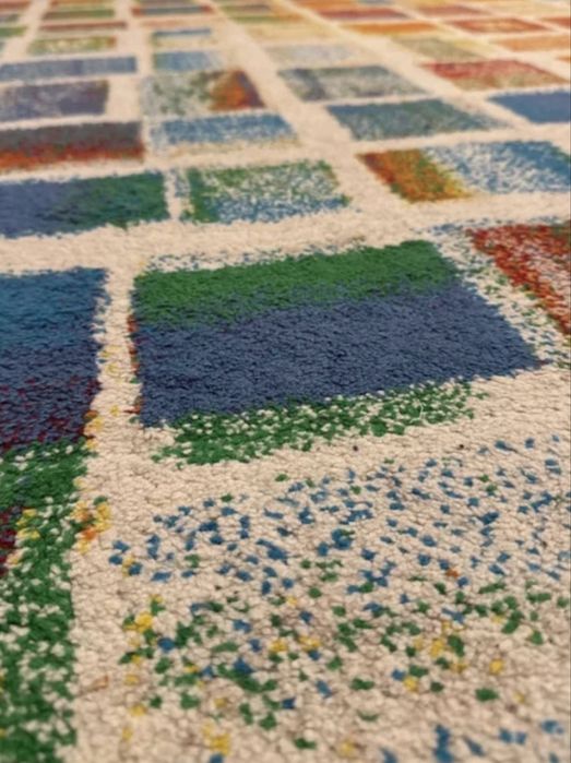 Tapete geométrico multicolorido