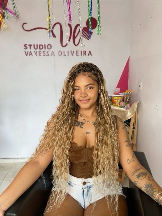 Tranças a domicilio sob taxa