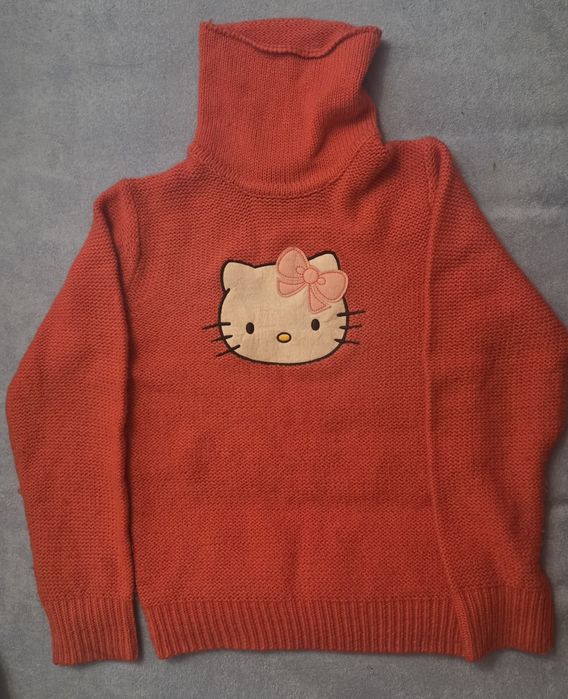 Golf dziewczęcy koralowy Hello Kitty 122-128