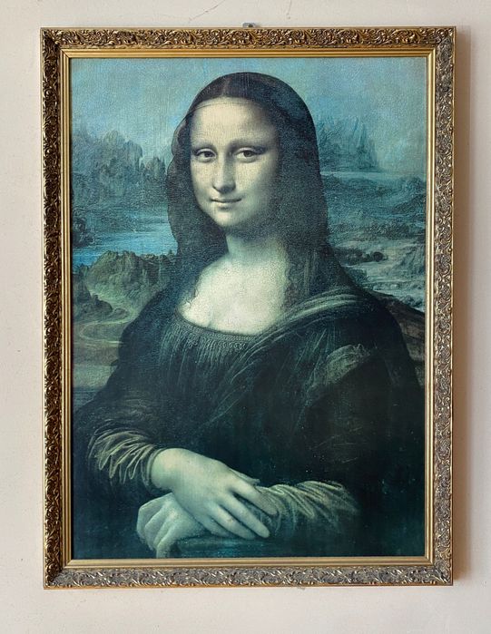 Reprodukcja obrazu „Mona Lisa” w eleganckiej złotej ramie